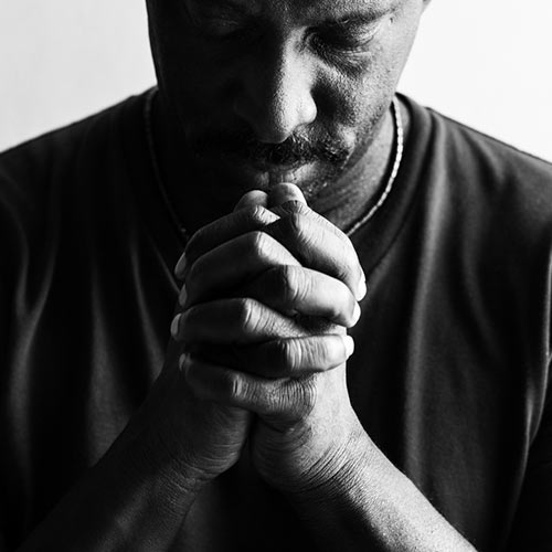 Image of a man praying