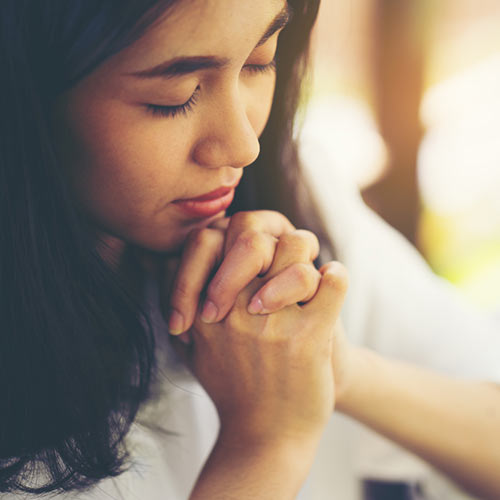 Image of woman praying